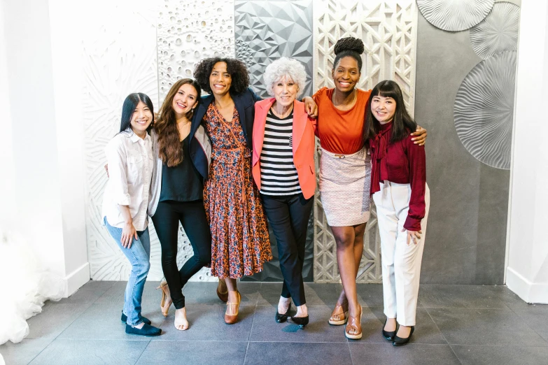 a group of women standing next to each other, inspired by Ruth Jên, altermodern, bay area, diverse textures, centered design, white haired lady