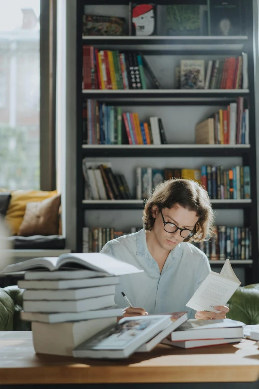 a woman sitting at a table reading a book, textbooks and books, reddit post, unbeatable quality, home office