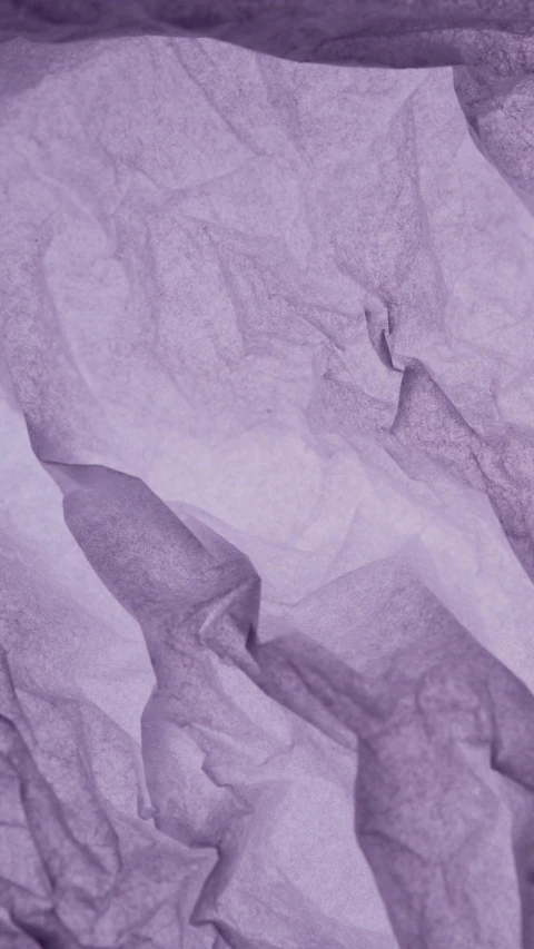 a black and white photo of a person laying in bed, an album cover, by Helen Stevenson, trending on pexels, gradient purple, paper crumpled texture, seamless fabric pattern 8k, geology