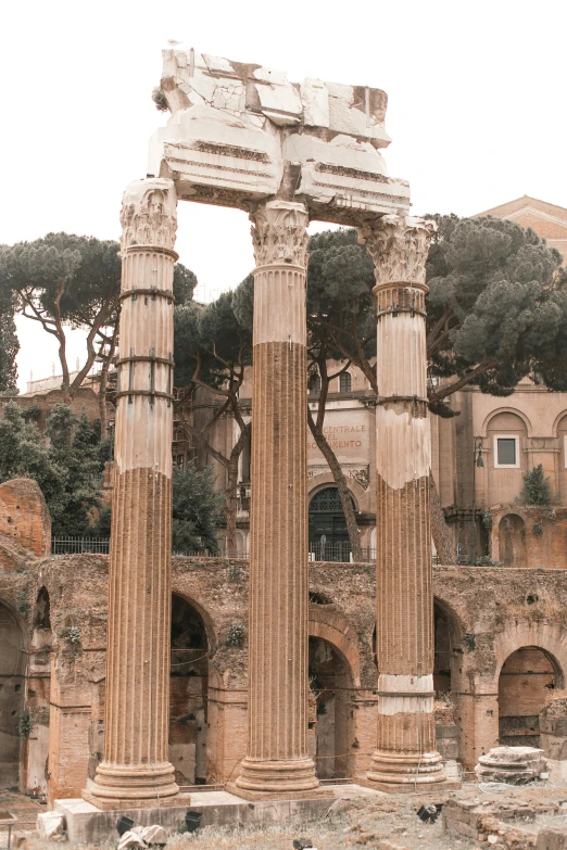 a group of people standing in front of a building, a picture, inspired by Caesar van Everdingen, pexels contest winner, neoclassicism, ornate city ruins, two towers, piled around, instagram story