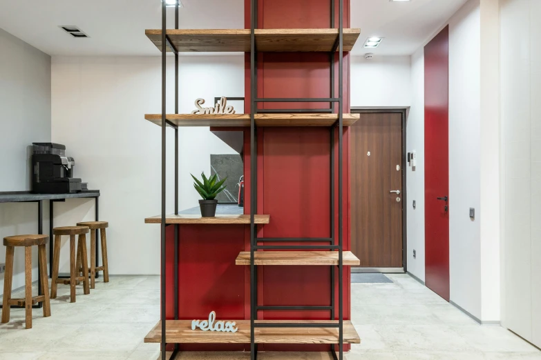 a room that has a bunch of shelves in it, red building, profile image, neo kyiv, wood accents