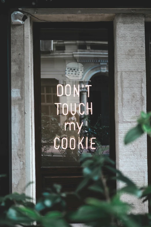 a sign that says don't touch my cookie, by Julia Pishtar, trending on pexels, window, front lit, 0, dofresh