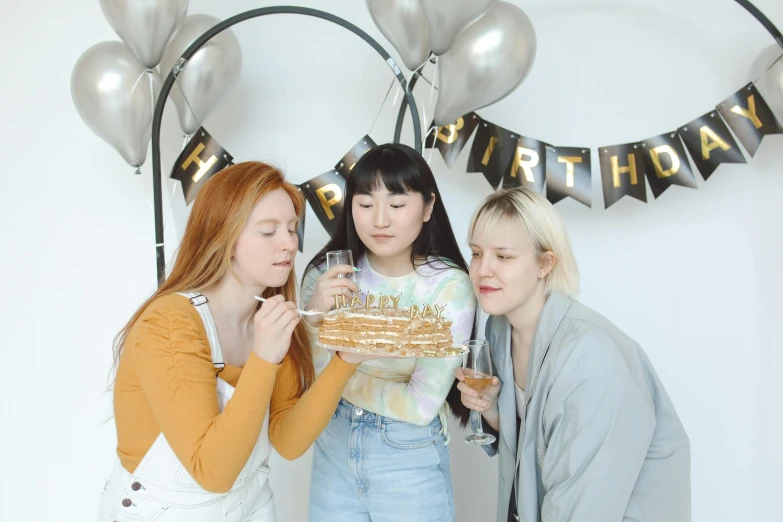 a group of women standing next to each other in front of a cake, pexels contest winner, hyperrealism, young asian girl, pals have a birthday party, ( ( theatrical ) ), sadie sink