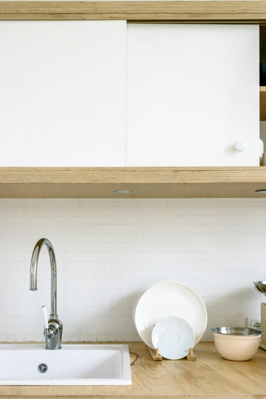 the kitchen is clean and ready for us to use, unsplash, minimalism, detailed white, portrait n - 9, worn, hq ”