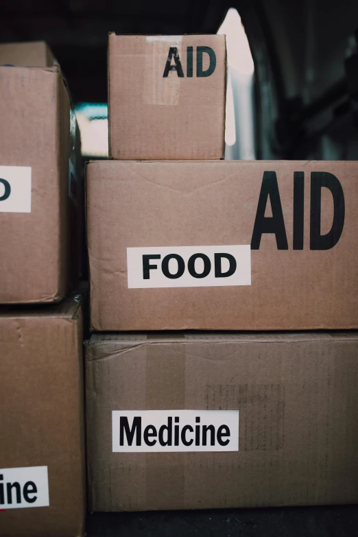 a bunch of boxes stacked on top of each other, medical labels, food focus, government archive, adi meyers