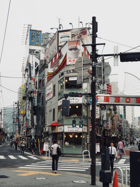 a city street filled with lots of tall buildings, a photo, inspired by Shinoda Toko, trending on unsplash, ukiyo-e, in front of ramen shop, 🚿🗝📝, iphone photo, cables everywhere