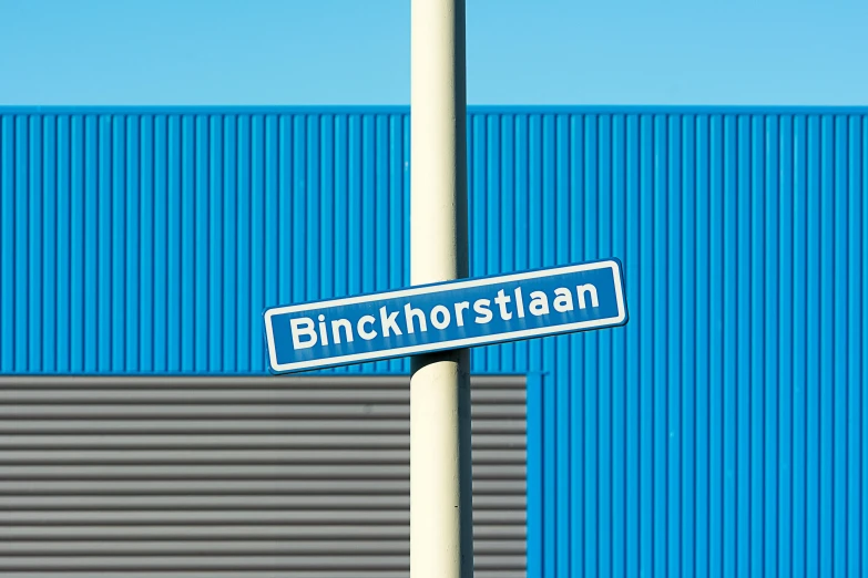 a close up of a street sign on a pole, inspired by Emil Bisttram, brutalism, dutch landscape, blue shutters on windows, product picture, industrial colours