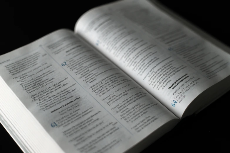 an open book sitting on top of a table