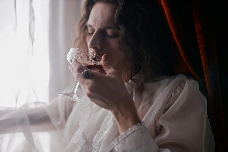 a woman drinking a glass of wine in front of a window, inspired by Elsa Bleda, pexels contest winner, renaissance, fine lace, joe keery, licking out, embroidered velvet