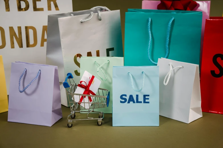 a pile of shopping bags sitting on top of a table, pexels contest winner, hyperrealism, square, commercial banner, mini model, holiday