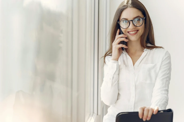 a woman in glasses talking on a cell phone, wearing a white blouse, realistic »