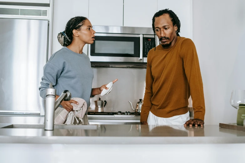 a man and a woman standing in a kitchen, by Everett Warner, pexels contest winner, arguing, diverse, profile image, promotional image