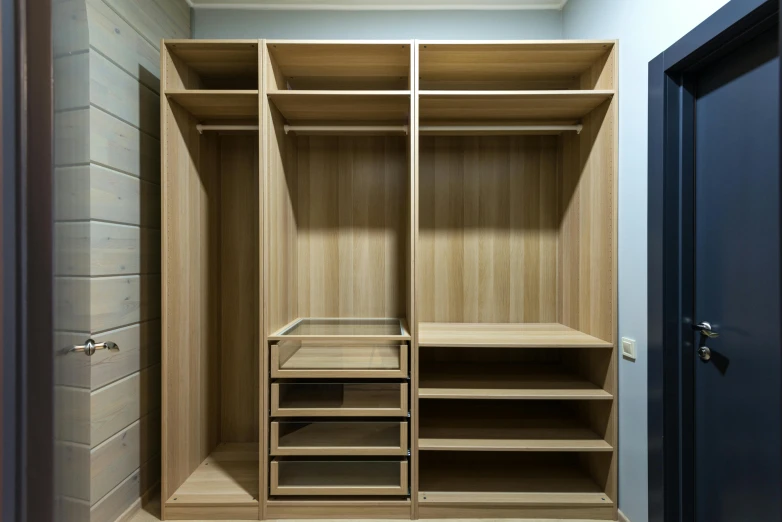 a walk in closet with wooden shelves and drawers, pexels, in a style of hyperrealism, closed limbo room, фото девушка курит, front