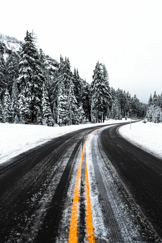 a black and white photo of a snowy road, unsplash contest winner, color picture, ice arrows, pacific northwest, square