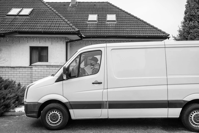 a white van parked in front of a house, a black and white photo, profile photo, thumbnail, customers, maintenance
