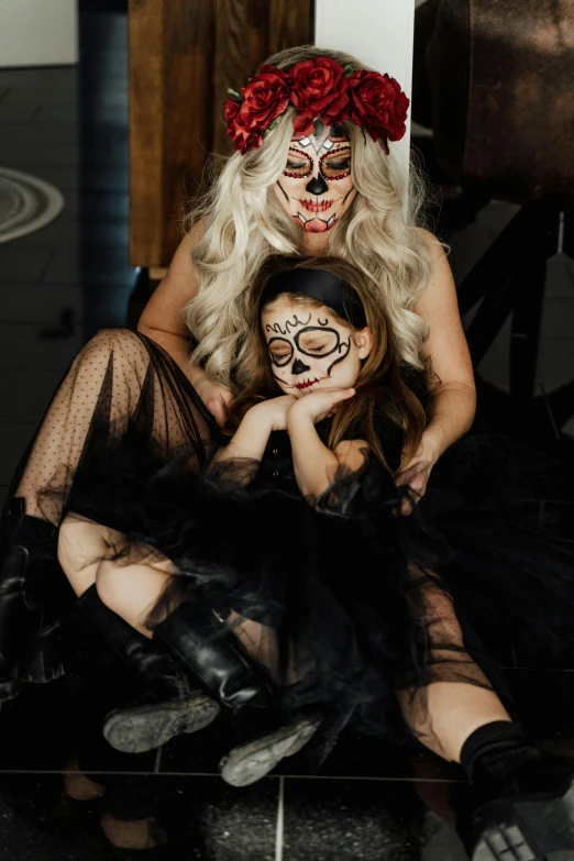 a couple of women sitting next to each other, lowbrow, halloween theme, profile image, flatlay, cats on her side