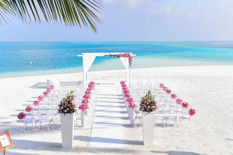 a wedding ceremony set up on the beach, pexels contest winner, pink and teal, somalia, beautifully bright white, luxurious environment