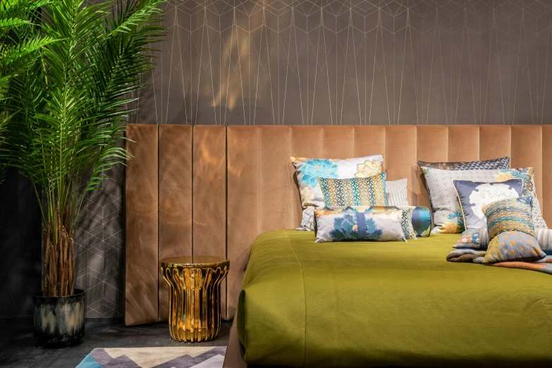 a bed sitting in a bedroom next to a potted plant, trending on cg society, maximalism, brown and gold color palette, chartreuse and orange and cyan, thumbnail, dezeen showroom