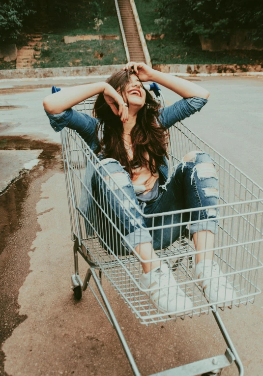 a woman is sitting in a shopping cart, pexels contest winner, ripped jeans, happy cozy feelings, teen girl, #trending