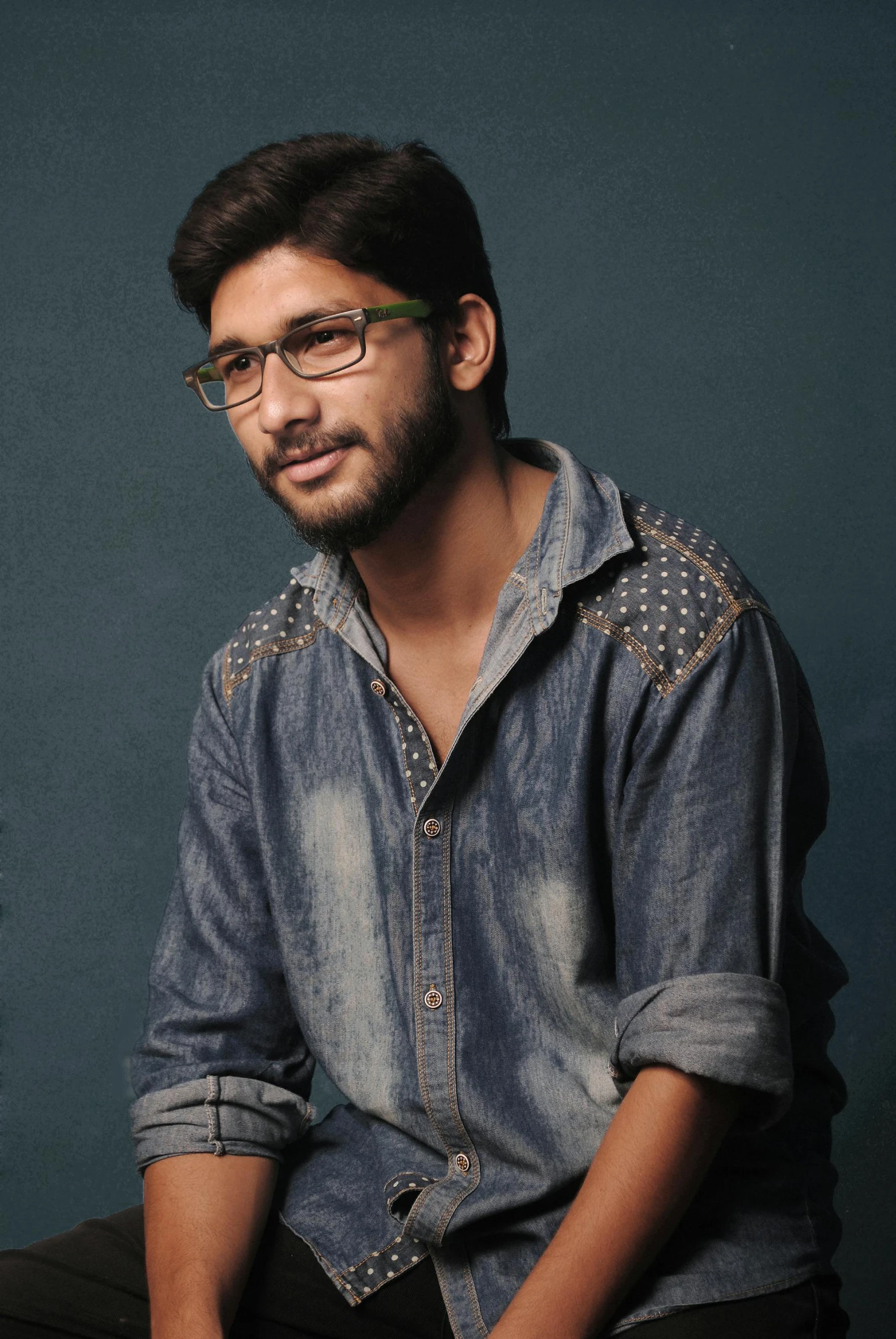 a man wearing glasses and a denim shirt, inspired by Jitish Kallat, actor, young male, 2019 trending photo, in 2 0 1 2