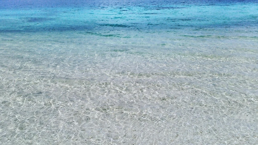 a large body of water with a boat in the distance, inspired by Vija Celmins, pexels contest winner, crystal clear blue water, water on the floor, clear colours, fiona staples