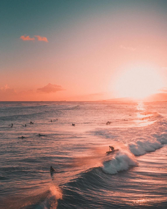 a group of people riding surfboards on top of a wave, pink golden hour, a photo of the ocean, waikiki beach, ((sunset))