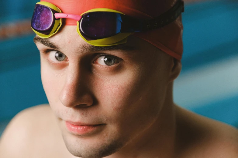 a close up of a person wearing goggles, a portrait, by Adam Marczyński, shutterstock, gofl course and swimming, lgbtq, avatar image, a handsome