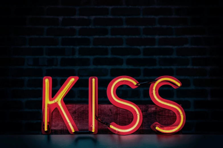 a neon sign that says kiss in front of a brick wall, trending on pexels, studio lighting”, olivia kemp, retro lights, profile image