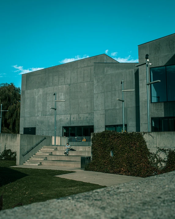 a man flying through the air while riding a skateboard, unsplash, brutalism, town hall, 4k museum photograph, very accurate photo, at college