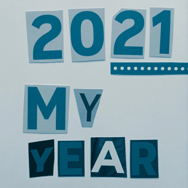 a sign that says 2021 is my year, an album cover, pixabay, cut-out paper collage, blue gray, thumbnail, for the highschool yearbook