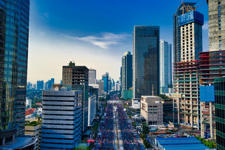 a city street filled with lots of tall buildings, pexels contest winner, hyperrealism, ancient indonesia, background image, square, big crowd