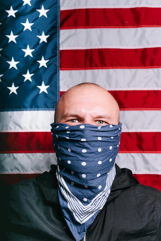 a bald man wearing a bandana in front of an american flag, inspired by Brian 'Chippy' Dugan, unsplash, renaissance, wearing mask, joe gb fenton, official product photo, patterned