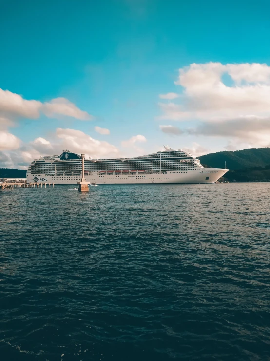 a large cruise ship in a body of water, profile image, fan favorite, shot on sony a 7, 2 5 6 x 2 5 6 pixels