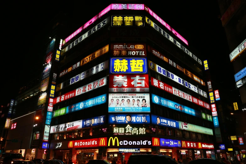 a building that has a lot of neon signs on it, by Bernardino Mei, advertising photo, square, japanese, mcdonald