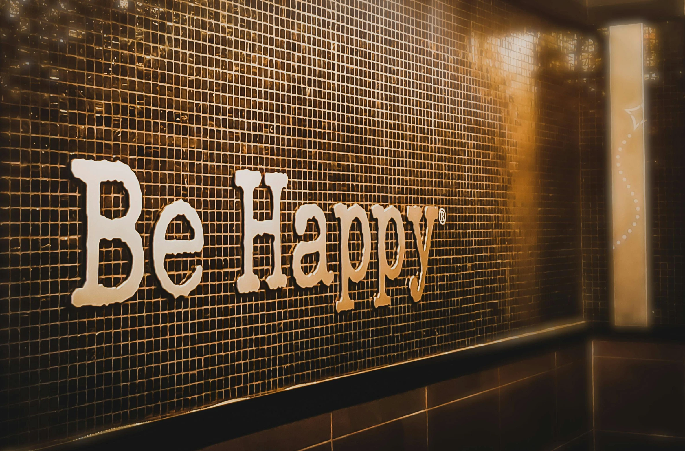 a close up of a sign on a wall, by Julia Pishtar, trending on unsplash, a still of a happy, no tiling, beeing happy, health spa and meditation center
