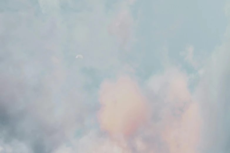 a plane flying through a cloudy blue sky, by Emma Andijewska, aestheticism, cotton candy, in muted colours, moon in sky, cinematic shot ar 9:16 -n 6 -g