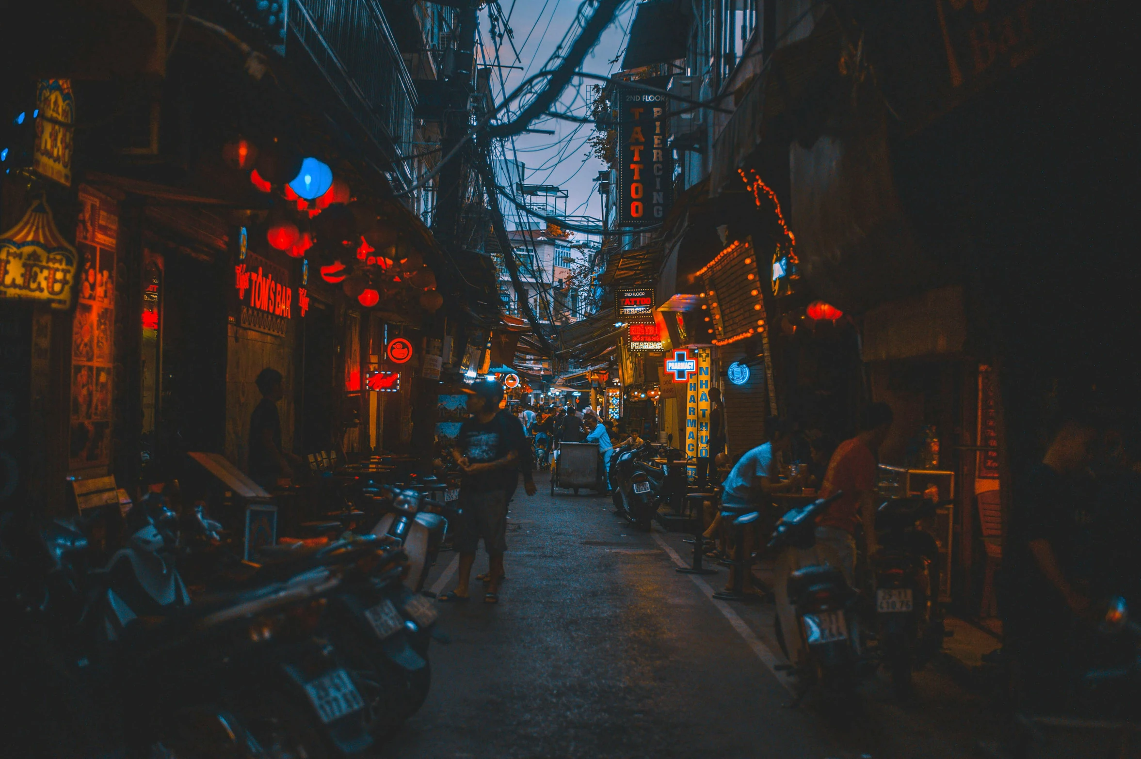 a street filled with lots of scooters and motorcycles, pexels contest winner, graffiti, evening lanterns, cyberpunk alley, old asian village, background image