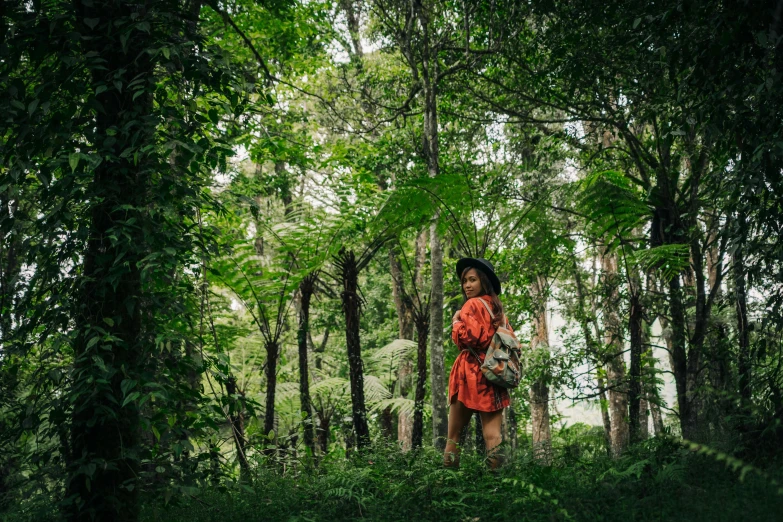 a woman standing in the middle of a forest, sumatraism, verdant and lush and overgrown, instagram photo, profile image, sydney park