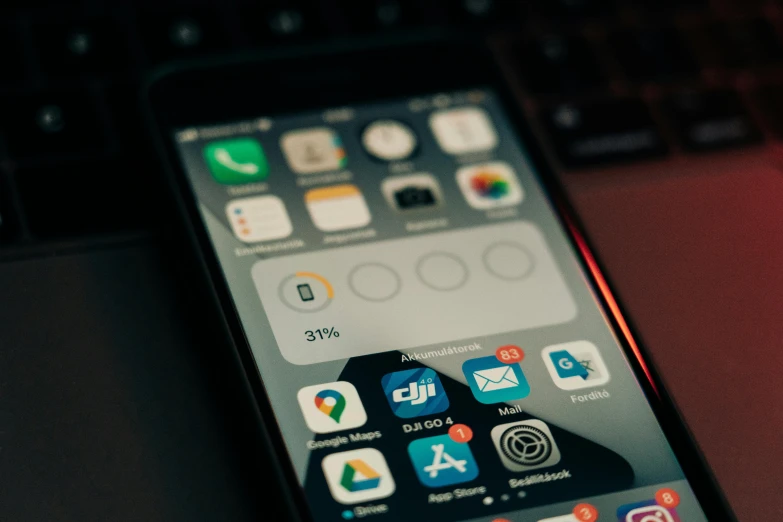a cell phone sitting on top of a laptop computer, pexels, realism, icon pack, professional iphone photo, blurred photo, 9 9 designs