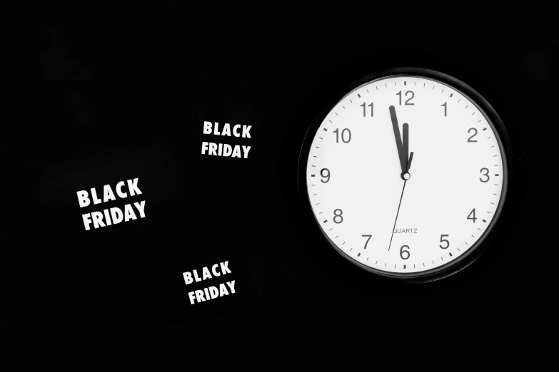 a clock with the words black friday written on it, a black and white photo, by Kristian Zahrtmann, hurufiyya, vantablack wall, background image, holiday, instagram photo