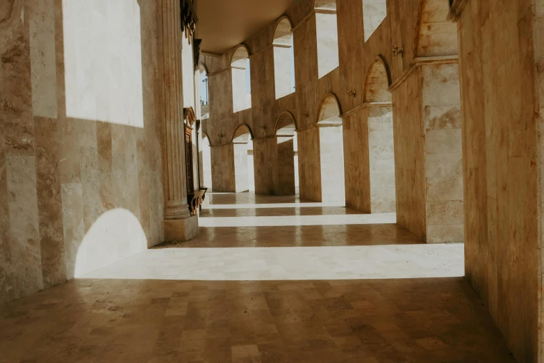 the sun shines through the arches of a building, a marble sculpture, inspired by Piero della Francesca, unsplash contest winner, light and space, reflective floor, interior of the old cathedral, some dappled light, brown