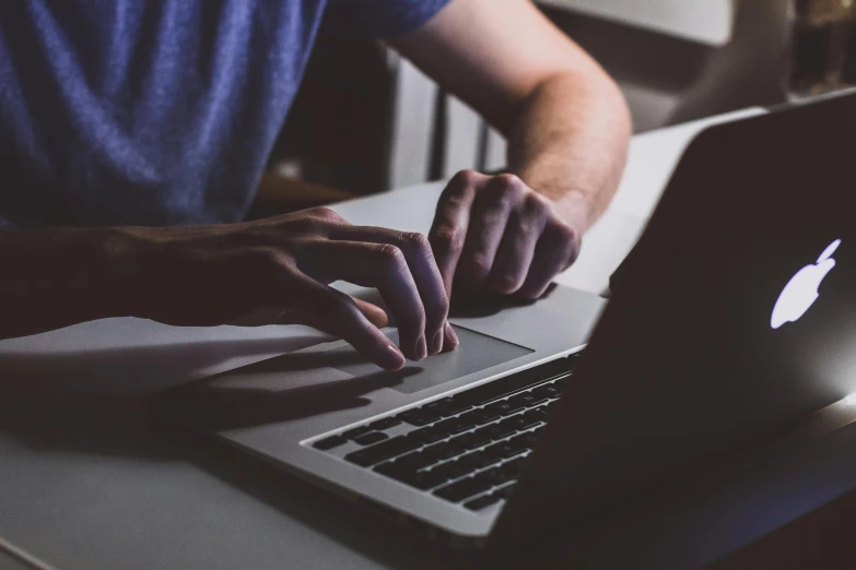 a close up of a person typing on a laptop, by Adam Marczyński, pexels, busy night, 15081959 21121991 01012000 4k