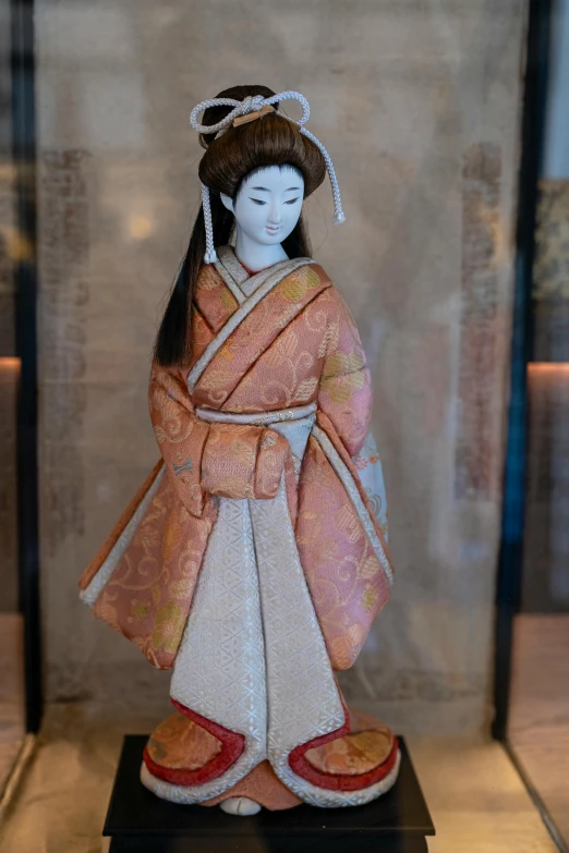 a statue of a geisha in a glass case, single clay museum sculpture, hanging silk scroll, stunningly detailed