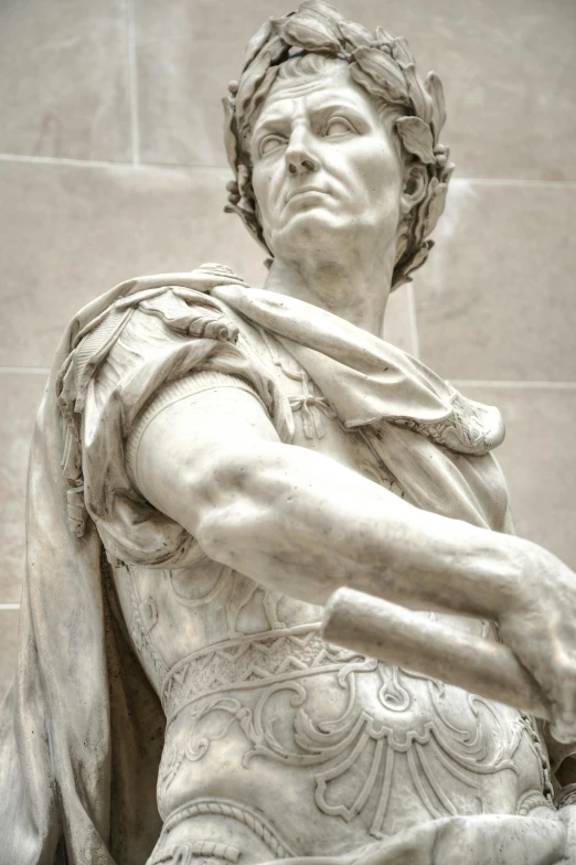 a statue of a man holding a sword, pexels contest winner, neoclassicism, white marble interior photograph, julius caesar, marvelous expression, french emperor