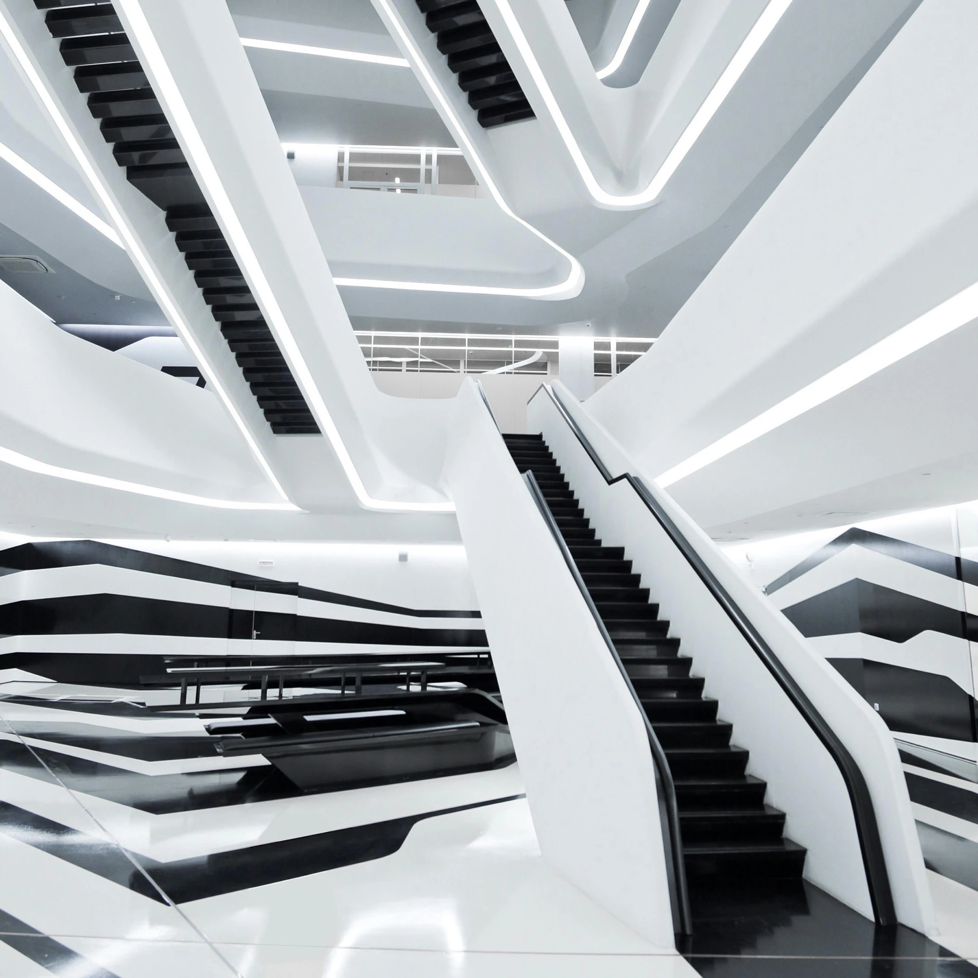 a couple of escalators that are in a building, inspired by Zha Shibiao, hypermodernism, white marble interior photograph, space high school, 8k render”, architecture award winning