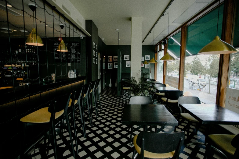 a black and white checkered floor in a restaurant, a portrait, unsplash, black and green scheme, multiple stories, romanian, pleasant cozy atmosphere