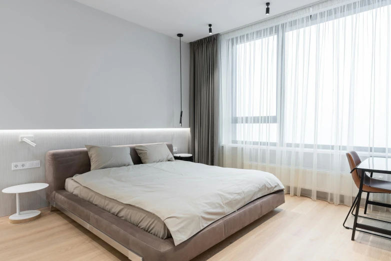 a bed sitting in a bedroom next to a window, by Harvey Quaytman, light and space, light grey mist, neutral lighting, fancy apartment, curtains