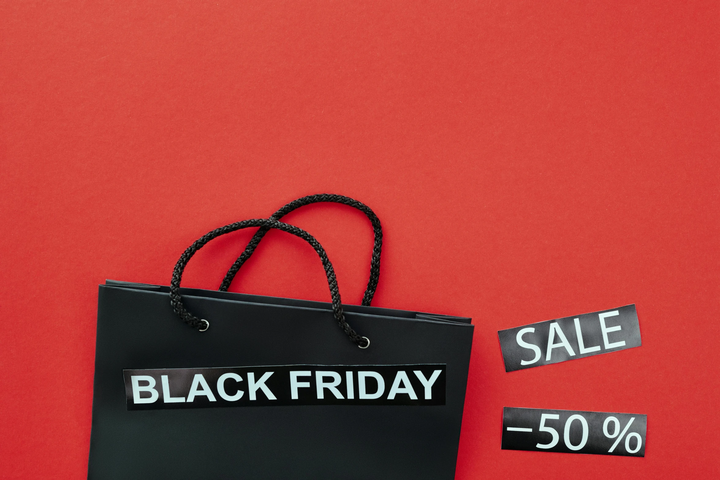 a black friday sale bag on a red background, by Julia Pishtar, hurufiyya, large format, 8l, matte black paper, thumbnail