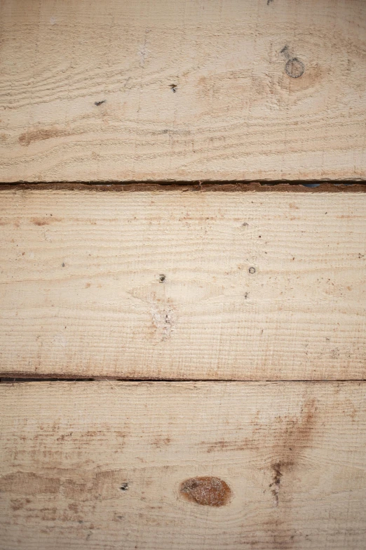 a close up view of a wooden surface, by David Simpson, unsplash, pallet, super high resolution, sunny light, sturdy