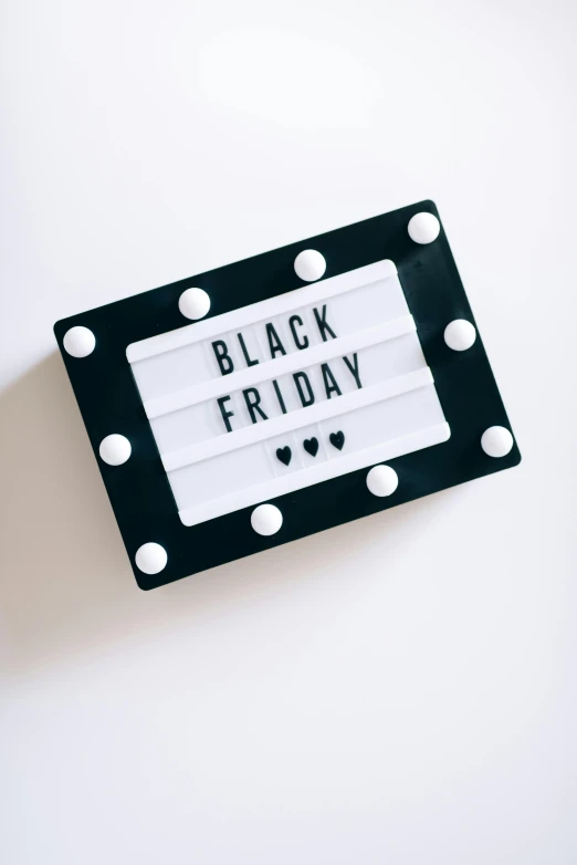 a black and white sign that says black friday, a black and white photo, trending on unsplash, thumbnail, holiday, 256435456k film, basic white background